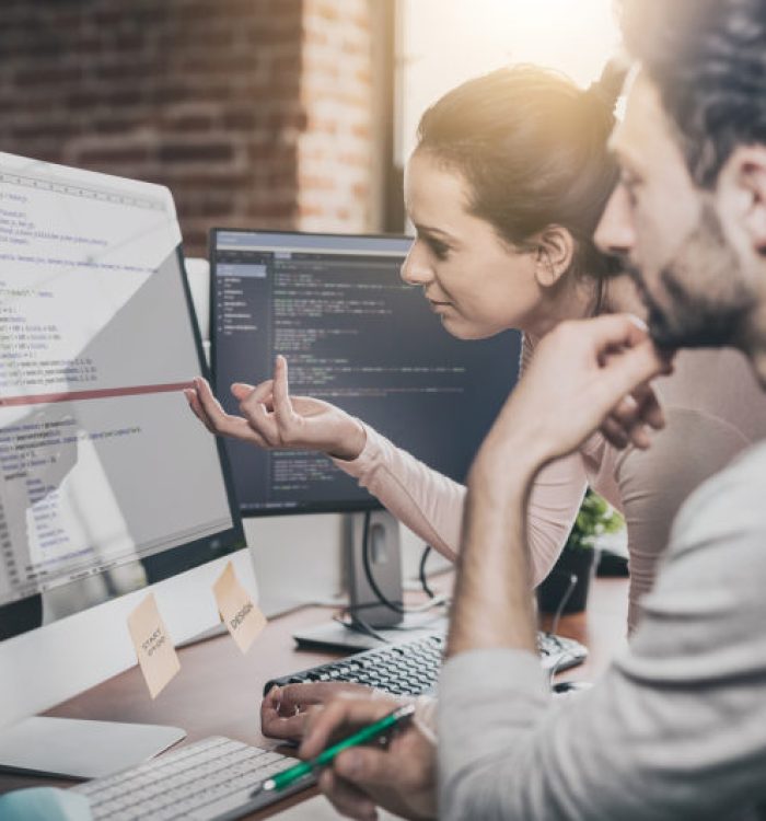 Developing programming and coding technologies. Website design. Programmer working in a software develop company office.